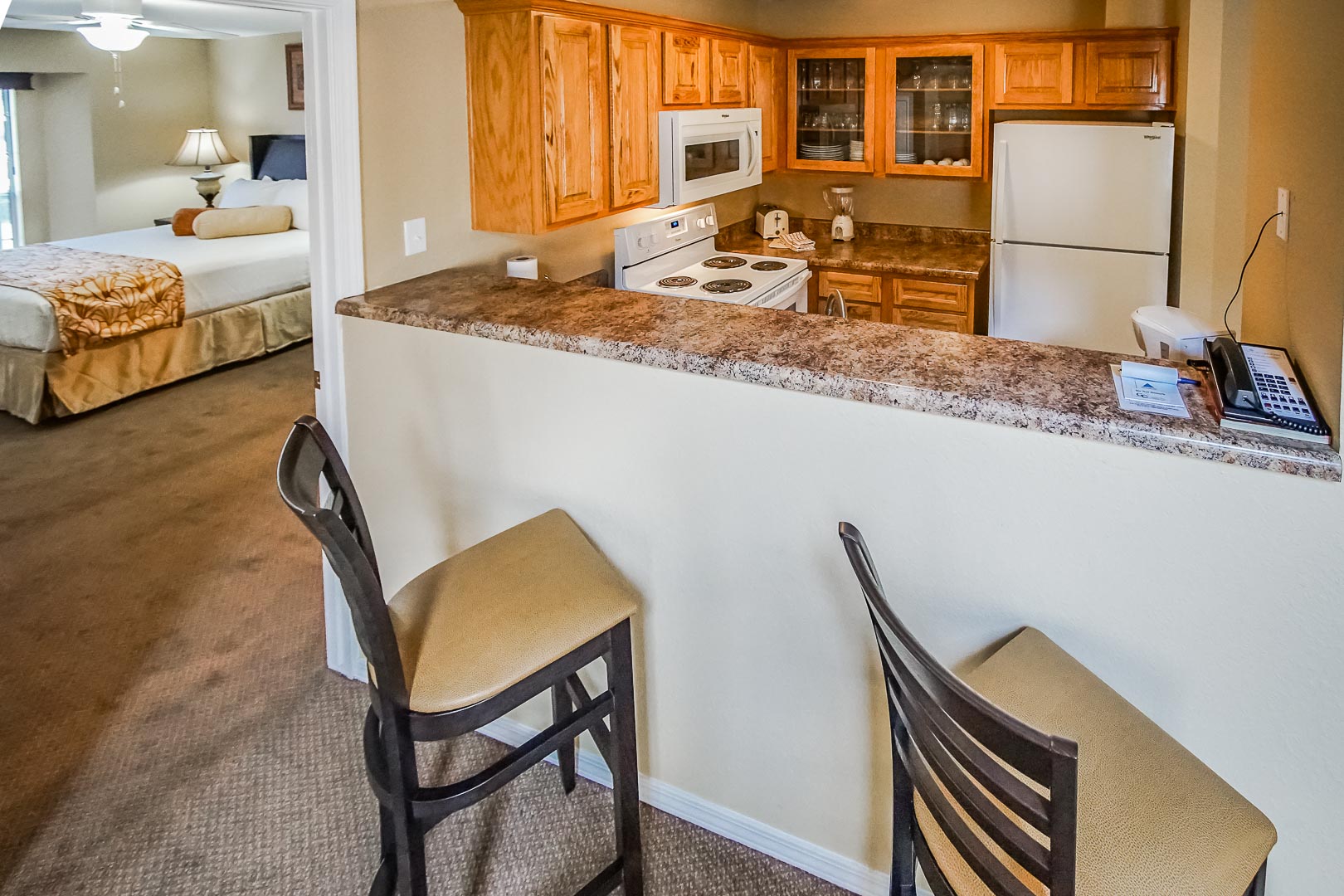 A fully equipped kitchen at The Townhouses Resort in Branson, Missouri.